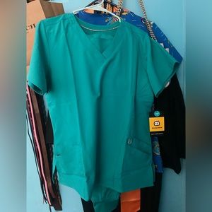 Teal Scrubs. Brand new with tags.